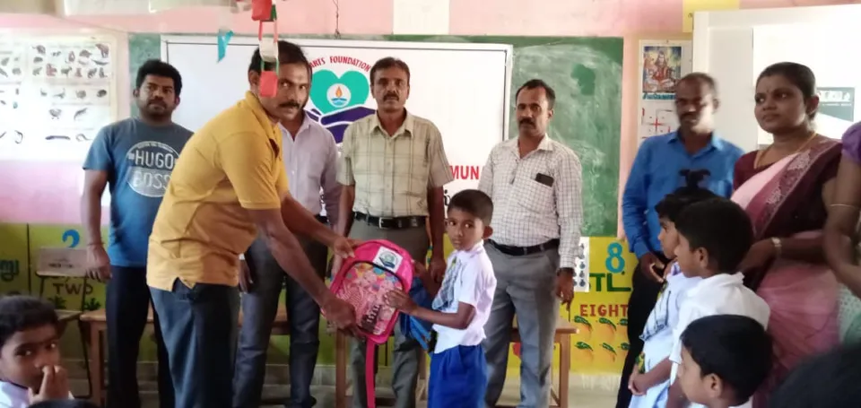 Provides School Book Bags to Students in Need