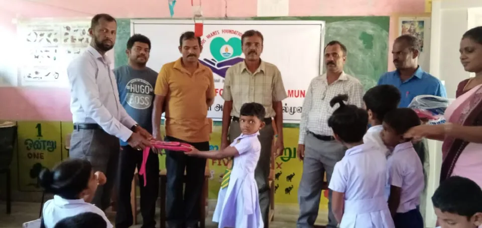 Provides School Book Bags to Students in Need