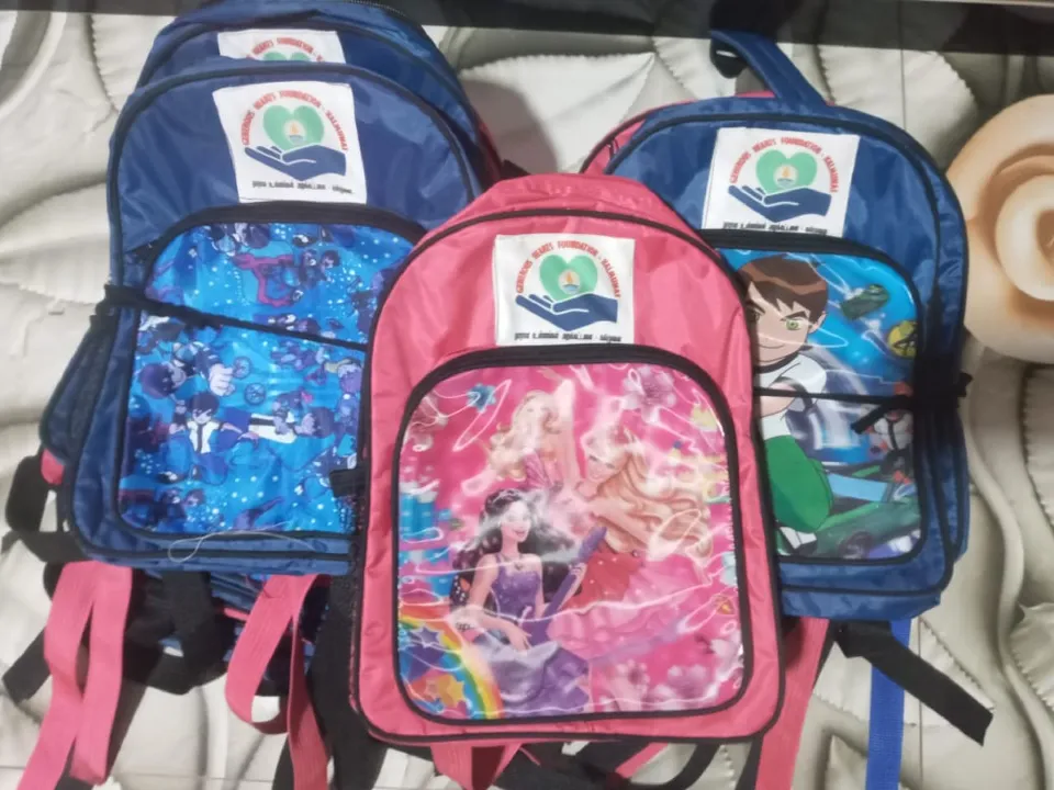 Provides School Book Bags to Students in Need